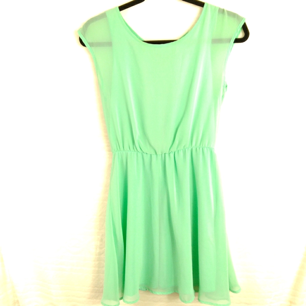 Miami's Sleeveless Beaded Back Mini Dress